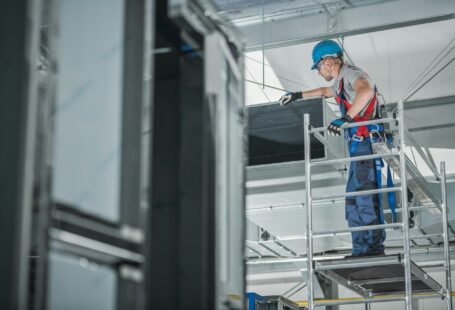 construction-worker-checking-newly-installed-air-ventilation