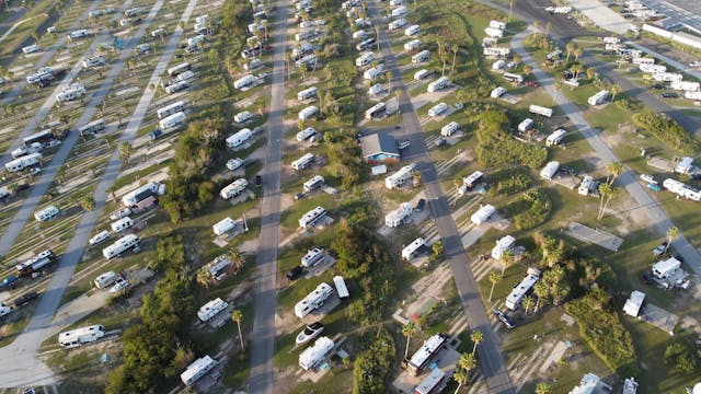 aerial-footage-with-campers-on-a-car-park