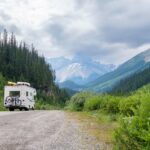 camping-van-on-the-road-in-the-mountains