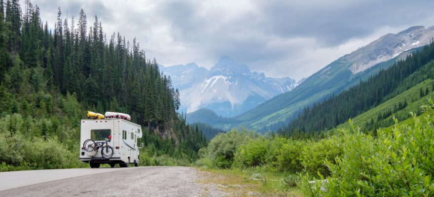 camping-van-on-the-road-in-the-mountains