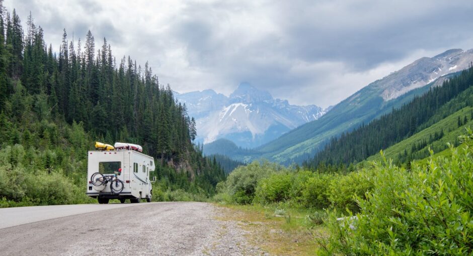 camping-van-on-the-road-in-the-mountains